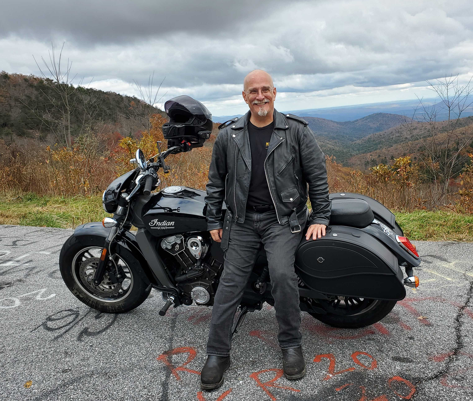 Rocky Oliver with his Indian Scout motorcycle in the Blue Ridge Mountains